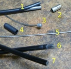 1. brake casing coils 2. brake ferrule 3. shift wire head 4. shift ferrule 5. shift wire 6. shift casing (worn out) 7. shift casing (new)
